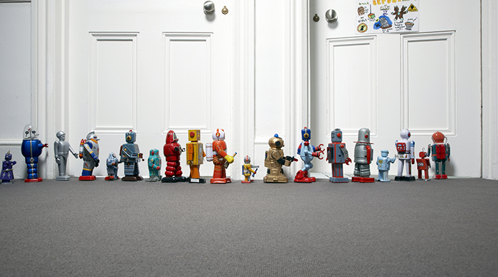 toy robots lined up outside childs bedroom