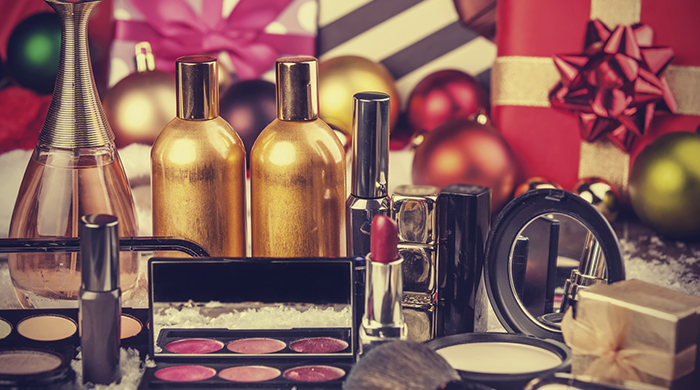 Cosmetics on christmas gifts background