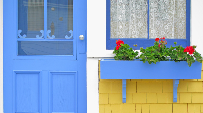 House with blue door and flower box