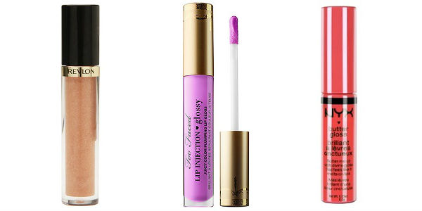 Three lip glosses in gold, purple, and pink