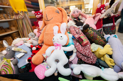 Heap of stuffed toys in gift store