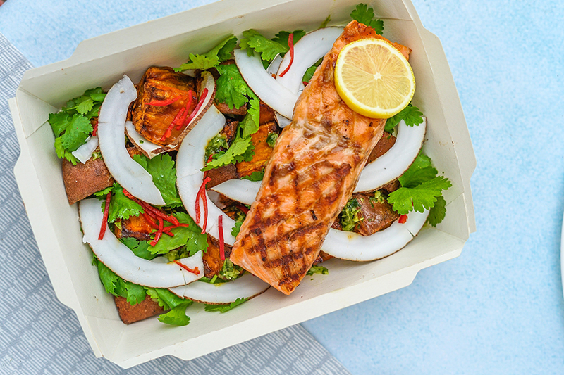 Salad with salmon in a box