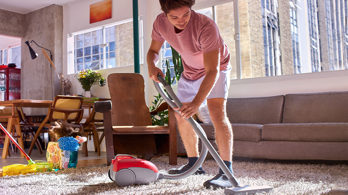 Man using the vacuum